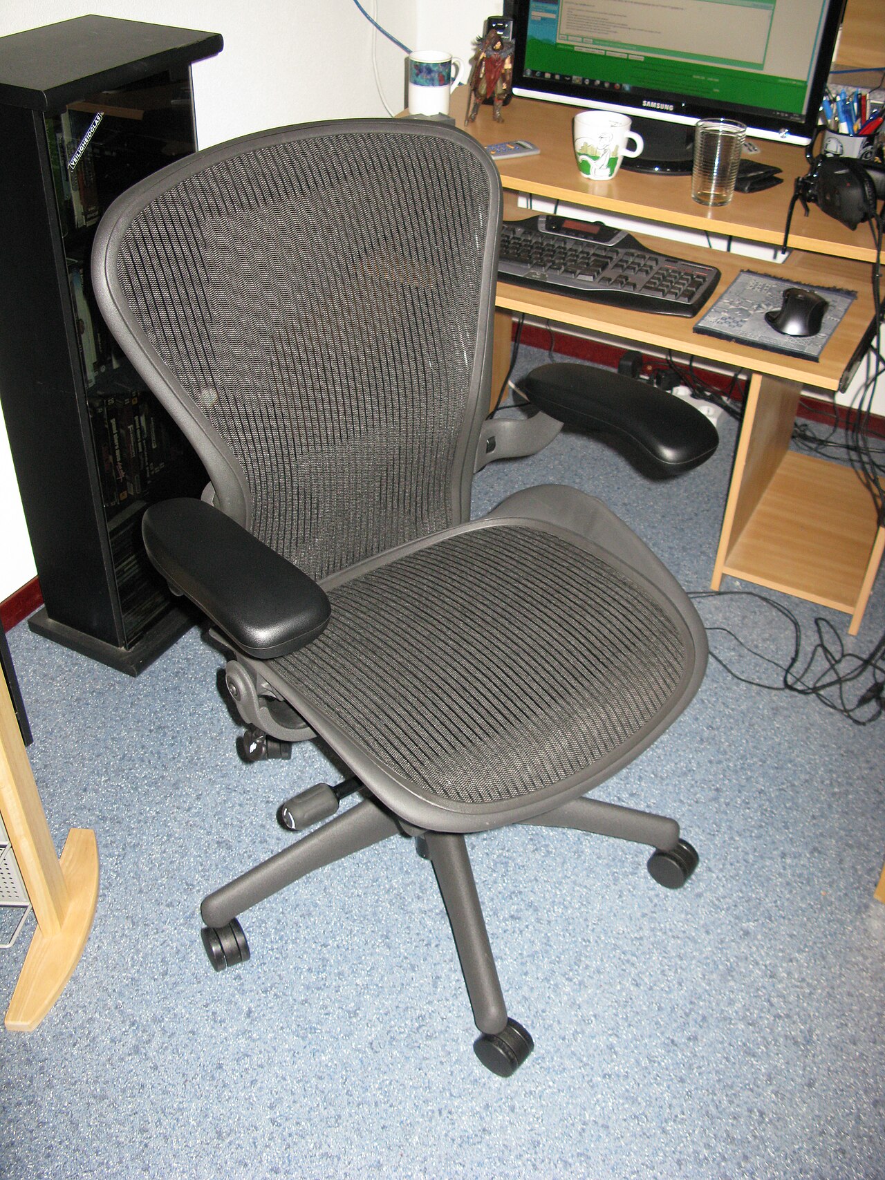Herman Miller Aeron ergonomic chair with mesh back, a compact chair that fits small apartments