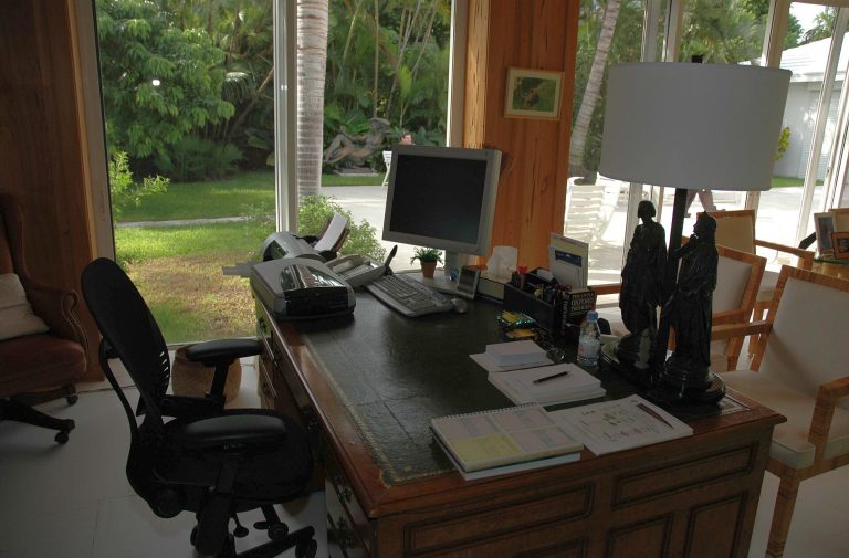 Home office ergonomics checklist on a desk