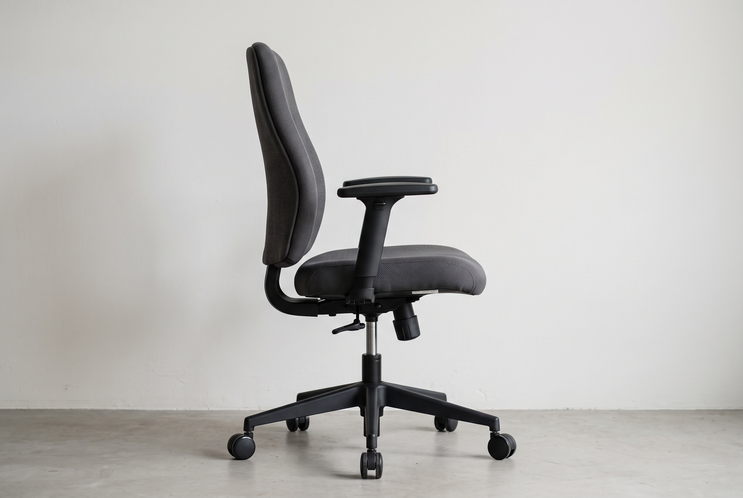 Ergonomic chair with fabric backrest