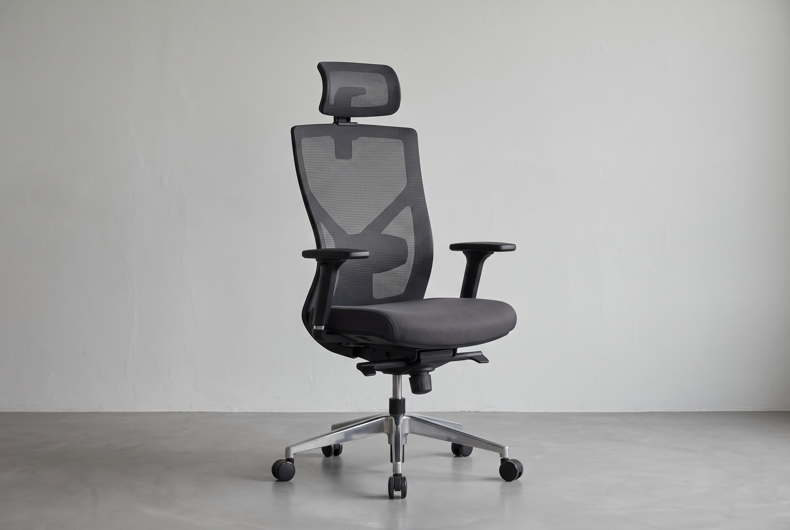 Mesh-back ergonomic chair with headrest