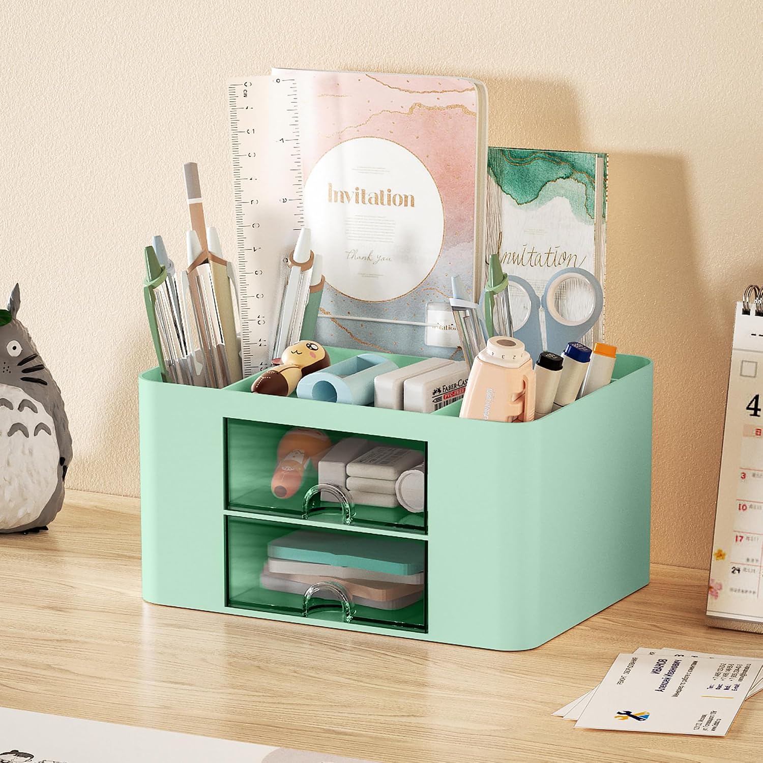 Green Marbrasse desktop pen organizer with upright compartments holding pens and markers